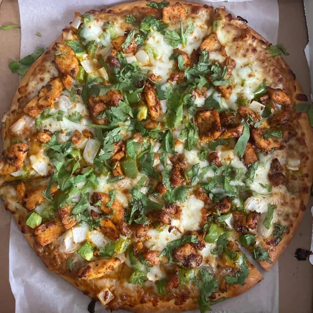 Bahubali Curry Chicken Pizza.