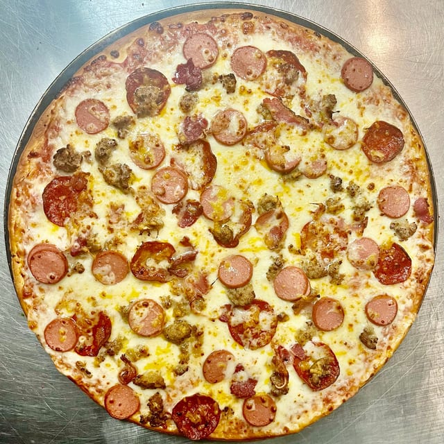 Meat & Cheese Deluxe Pizza.