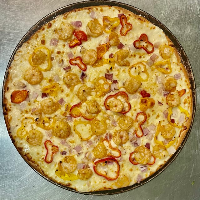 Cajun Shrimp Alfredo Pizza.