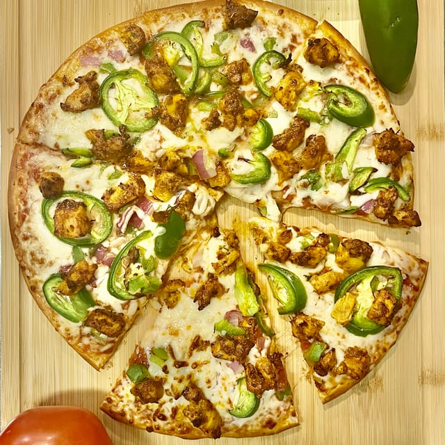 Masala Tandoori Chicken Pizza.