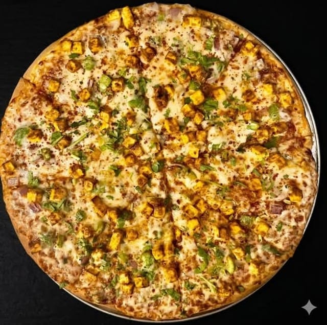Jain Masala Paneer Pizza.